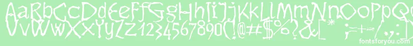 Dikovina Font – White Fonts on Green Background