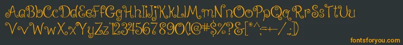 RalphieBrownRegular Font – Orange Fonts on Black Background