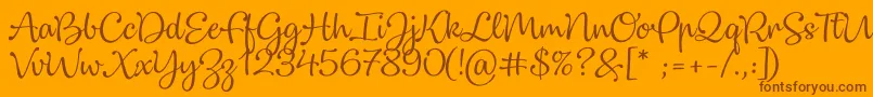 Czcionka Dulcelin – brązowe czcionki na pomarańczowym tle