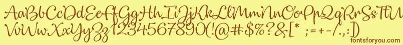 Dulcelin Font – Brown Fonts on Yellow Background