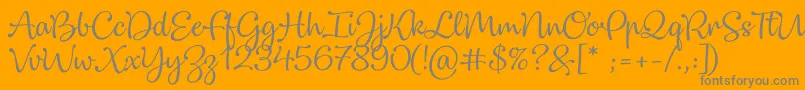 Dulcelin-Schriftart – Graue Schriften auf orangefarbenem Hintergrund