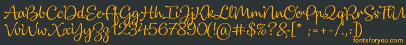 Dulcelin Font – Orange Fonts on Black Background