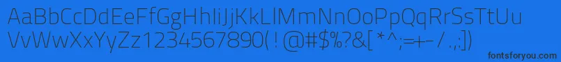 Titilliumtext22l1wt-Schriftart – Schwarze Schriften auf blauem Hintergrund