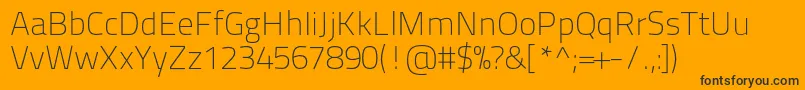 Titilliumtext22l1wt-fontti – mustat fontit oranssilla taustalla