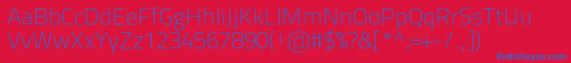 Titilliumtext22l1wt-Schriftart – Blaue Schriften auf rotem Hintergrund