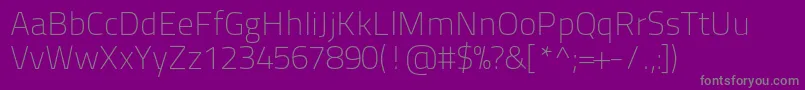 Titilliumtext22l1wt-fontti – harmaat kirjasimet violetilla taustalla