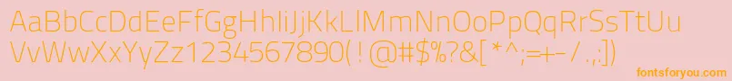 フォントTitilliumtext22l1wt – オレンジの文字がピンクの背景にあります。