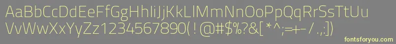 Titilliumtext22l1wt-fontti – keltaiset fontit harmaalla taustalla