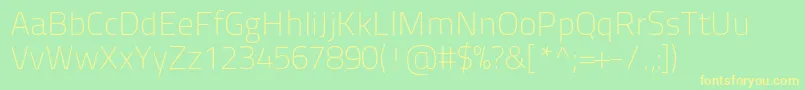 Titilliumtext22l1wt-fontti – keltaiset fontit vihreällä taustalla