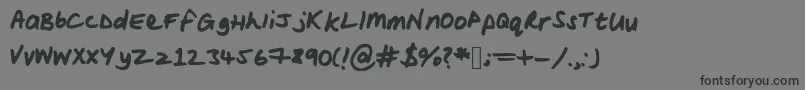 Шрифт Woodsscript – чёрные шрифты на сером фоне