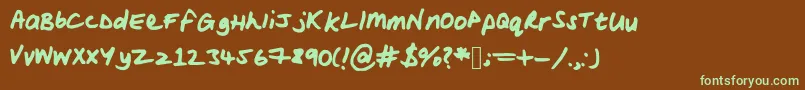 Fonte Woodsscript – fontes verdes em um fundo marrom