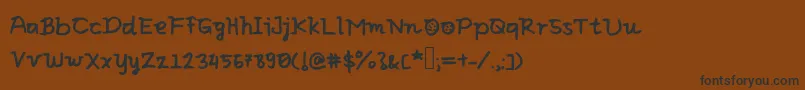 Eliclovesbiscuit Font – Black Fonts on Brown Background
