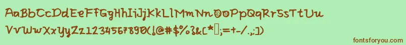 Eliclovesbiscuit Font – Brown Fonts on Green Background