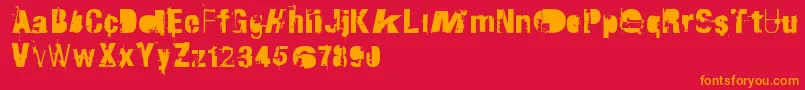 フォントRvdTraktorfahrer – 赤い背景にオレンジの文字