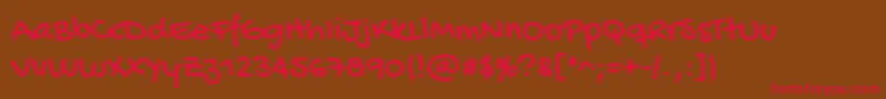 GochihandRegular Font – Red Fonts on Brown Background