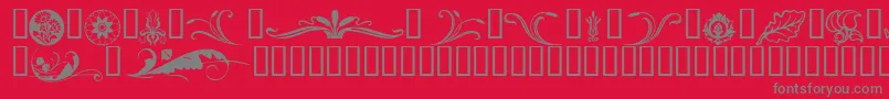 フォントFlorals2 – 赤い背景に灰色の文字