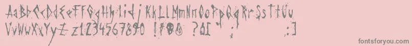 フォントAgresivefont – ピンクの背景に灰色の文字