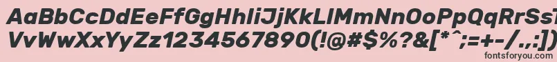 RubikBolditalic-fontti – mustat fontit vaaleanpunaisella taustalla