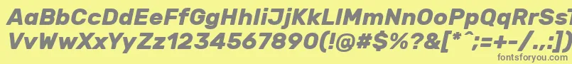 フォントRubikBolditalic – 黄色の背景に灰色の文字