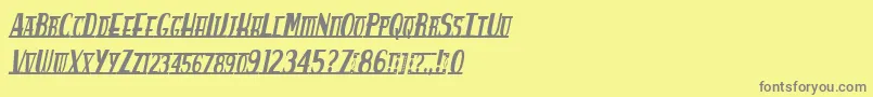 Spankys Bungalow Italico-fontti – harmaat kirjasimet keltaisella taustalla