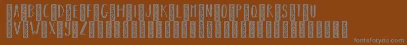 BearhugsbyratticsassinRegular Font – Gray Fonts on Brown Background