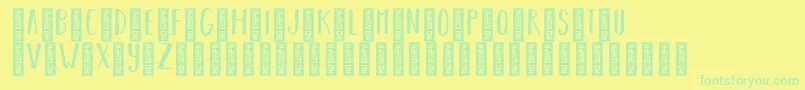 Fonte BearhugsbyratticsassinRegular – fontes verdes em um fundo amarelo
