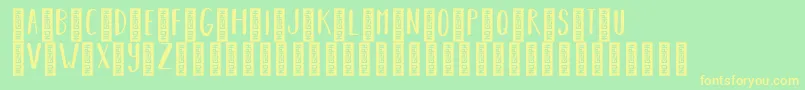 BearhugsbyratticsassinRegular Font – Yellow Fonts on Green Background