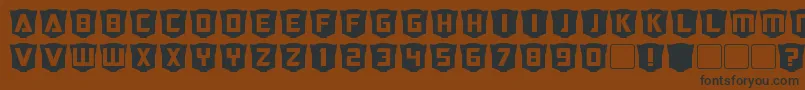 RubcapsCybertron Font – Black Fonts on Brown Background