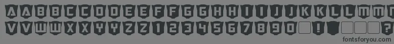 RubcapsCybertron Font – Black Fonts on Gray Background