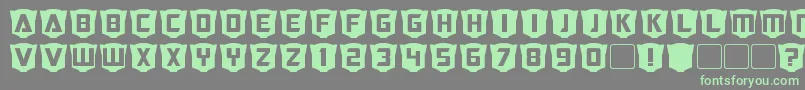 フォントRubcapsCybertron – 灰色の背景に緑のフォント