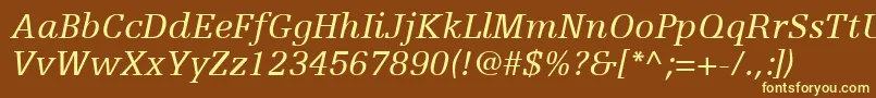 EgyptienneFLt56Italic-fontti – keltaiset fontit ruskealla taustalla