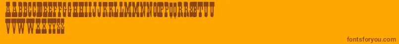 Fisticuffs-Schriftart – Braune Schriften auf orangefarbenem Hintergrund