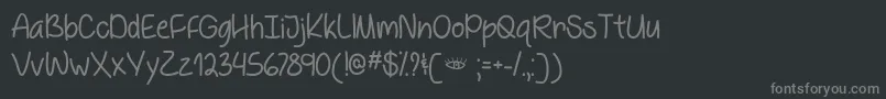 Czcionka BehindBlueEyesTtf – szare czcionki na czarnym tle