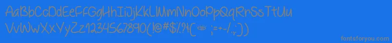 BehindBlueEyesTtf Font – Gray Fonts on Blue Background