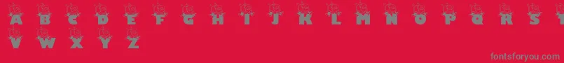 フォントJollysanta – 赤い背景に灰色の文字