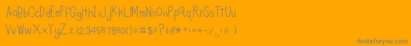 Czcionka Charleesinahurry – szare czcionki na pomarańczowym tle