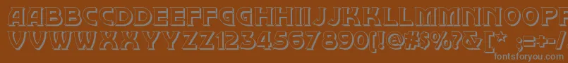 Brownwoodshadownf-fontti – harmaat kirjasimet ruskealla taustalla