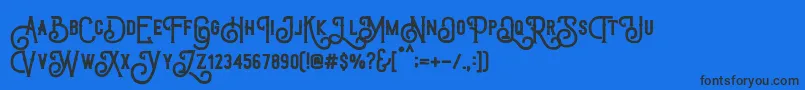 TriumphWheelsRough-Schriftart – Schwarze Schriften auf blauem Hintergrund