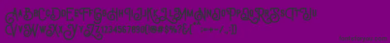 TriumphWheelsRough-fontti – mustat fontit violetilla taustalla
