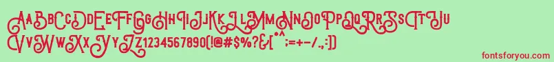 フォントTriumphWheelsRough – 赤い文字の緑の背景
