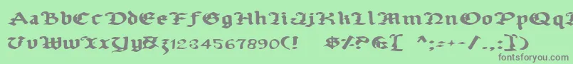 フォントUberhГ¶lmeExpanded – 緑の背景に灰色の文字