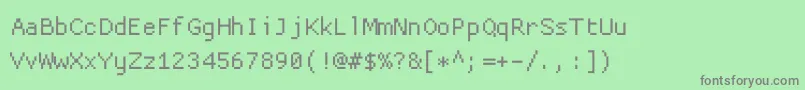 Proggycleansz-fontti – harmaat kirjasimet vihreällä taustalla