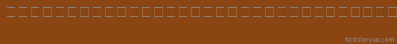 SampleEsf2Normal Font – Gray Fonts on Brown Background