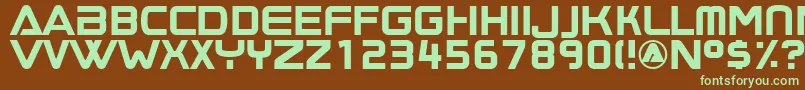 フォントBoombox ffy – 緑色の文字が茶色の背景にあります。