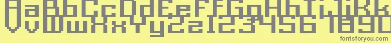 Шрифт Acme9RegularBoldXtnd – серые шрифты на жёлтом фоне
