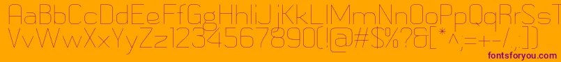 Czcionka MetricnavyThin – fioletowe czcionki na pomarańczowym tle