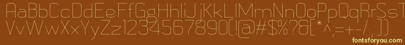 MetricnavyThin-fontti – keltaiset fontit ruskealla taustalla