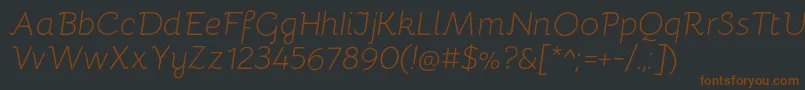 BellotaLightitalic-fontti – ruskeat fontit mustalla taustalla