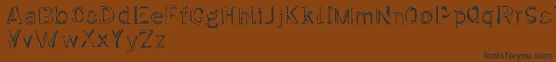 Dirtfont-Schriftart – Schwarze Schriften auf braunem Hintergrund