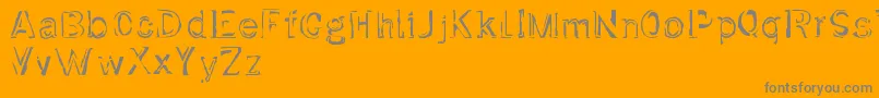 Czcionka Dirtfont – szare czcionki na pomarańczowym tle
